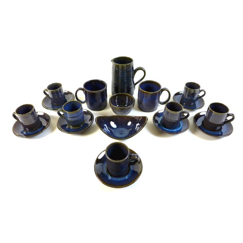 21 - Stephanie Kalan (British, 1909-1978): a studio pottery part coffee set, comprising seven coffee cups... 