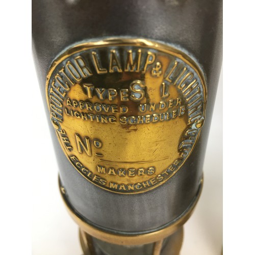 81 - A collection of 19th and early 20th century miner’s lamps, including two marked ‘The Protector Lamp ... 