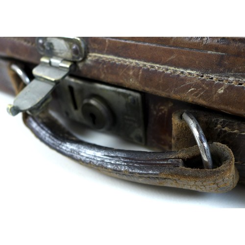 134 - A Linsley Brothers chromed brass bound brown leather shotgun case, early 20th century, the lid embos... 