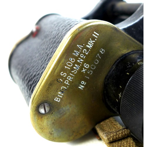 127 - A pair of WWII military binoculars, brass and black leather covered, engraved markings ‘Taylor-Hobso... 