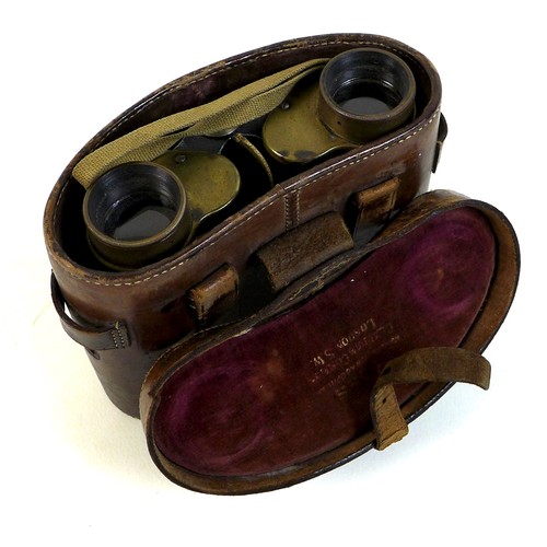 127 - A pair of WWII military binoculars, brass and black leather covered, engraved markings ‘Taylor-Hobso... 