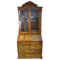 A Dutch 19th century marquetry bureau bookcase, with arched moulded cornice above twin glazed doors ... 