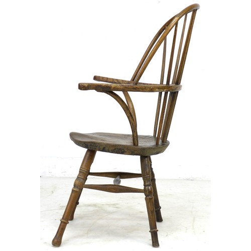 298 - An unusual 18th century and later elm and oak Windsor armchair, with open bowed arm rest, five stick... 