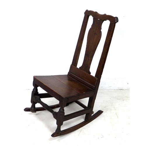 301 - A Georgian nursing or rocking chair, likely early to mid 18th century, with shaped back, 46 by 61 by... 