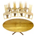 A fine contemporary oak bespoke handmade oval dining table, together with eight matching modern desi... 