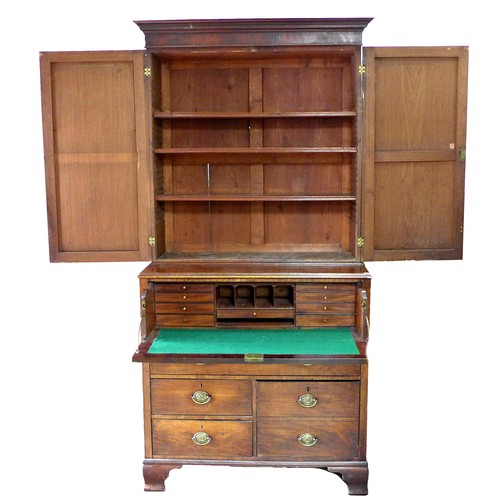 270 - A George III mahogany bookcase, twin door enclosing shelves, secretaire drawer over one wide, one ce... 