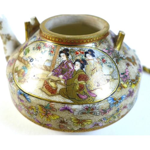 10 - A fine Japanese Satsuma pottery teapot, Meiji period, with gilt metal swing handle, finely painted i... 