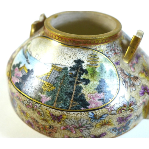 10 - A fine Japanese Satsuma pottery teapot, Meiji period, with gilt metal swing handle, finely painted i... 