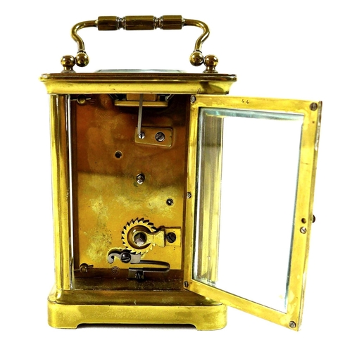 113 - A French brass carriage clock, late 19th century, with five glass case, white dial with black Roman ... 