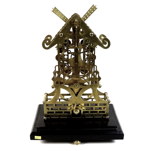 116 - A Trigona brass skeleton clock in the form of a windmill, mid 20th century, with 8 day fusee movemen... 