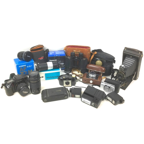 119 - A collection of cameras and accessories, including, a Canon EOS 100 camera, a Canon Ultrasonic Zoom ... 