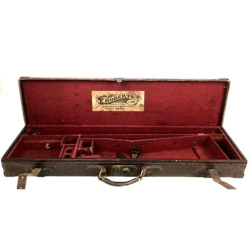 123 - Three vintage gun cases, comprising an early 20th century E. Roberts of Birmingham leather case with... 