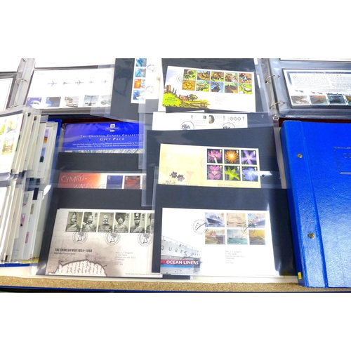 148 - A large collection of presentation packs and first day covers, mostly Bristish, dating from 1970's o... 