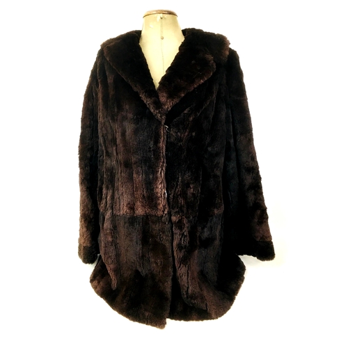 155 - A vintage half length mink coat, labelled 'Serviced by Victor Segall, London', 85cm back length.