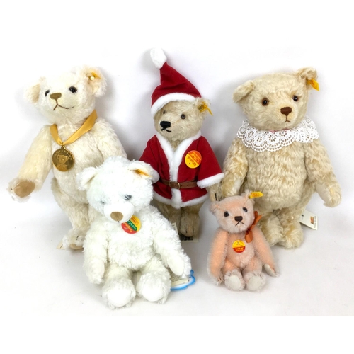 162 - A group of five Steiff soft toy teddy bears, comprising a Millenium bear with Danbury Mint medallion... 