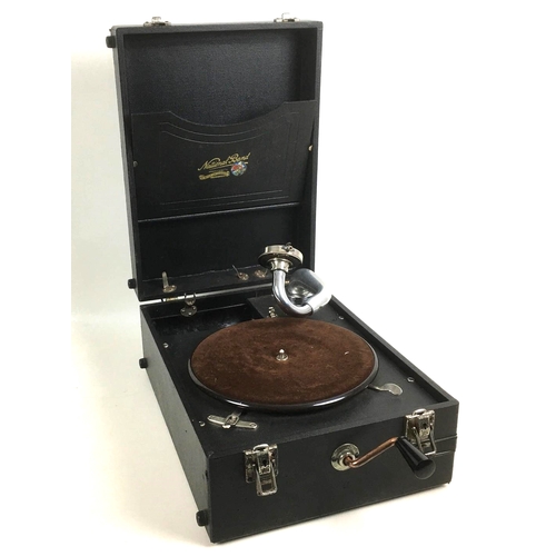 171 - A vintage portable wind up gramophone player, with vinyl record. (2)