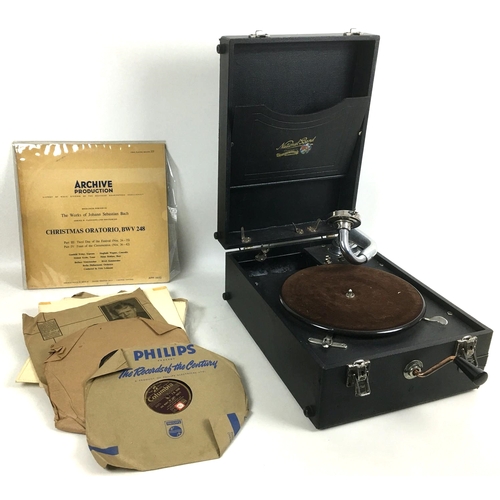 171 - A vintage portable wind up gramophone player, with vinyl record. (2)