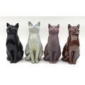 A group of North Shore pottery, comprising four ceramic cats two signed JMR on base, height of each ... 