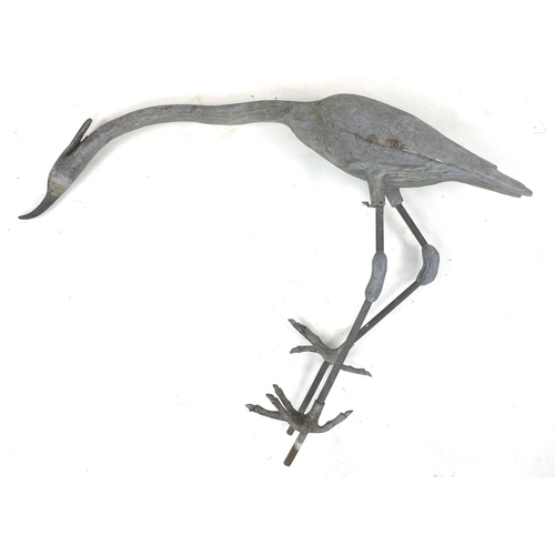 275 - A life size lead Heron garden ornament, 103 by 20 by 70cm high.