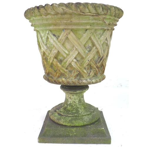 277 - Two stoneware garden urn planters decorated with a woven rush effect with associated bases, urns, 40... 