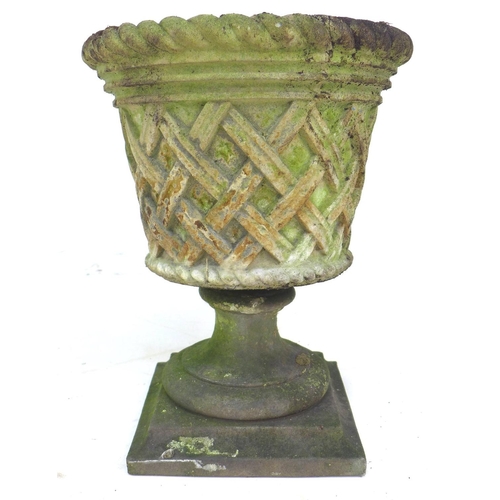 277 - Two stoneware garden urn planters decorated with a woven rush effect with associated bases, urns, 40... 