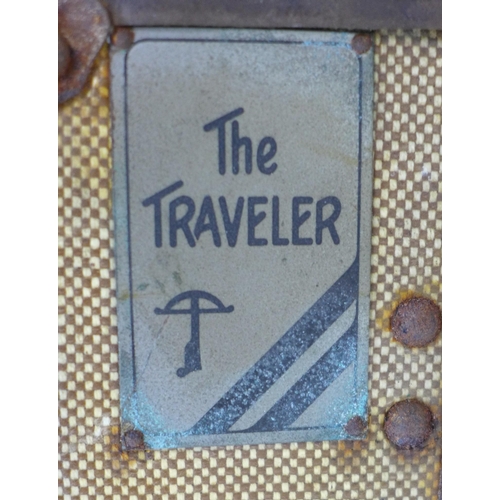 279 - Two vintage travelling trunks, canvas covered and leather bound, one labelled 'The Traveller', 80 by... 