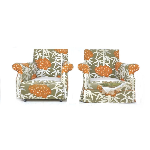 288 - A pair of modern armchairs, upholstered in bright floral fabric, 87 by 93 by 75.5cm high. (2)