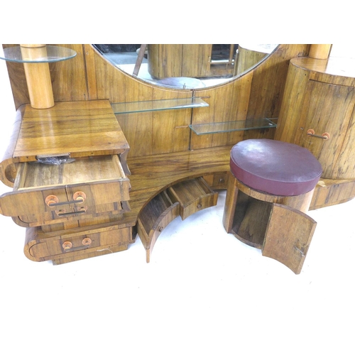 292 - An African ofram wood Art Deco style dressing table, with large circular mirror and an arrangement o... 