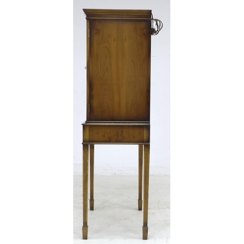 294 - A vintage Art Forma yew wood veneered drinks cocktail cabinet, with cupboard above two drawers, 62 b... 