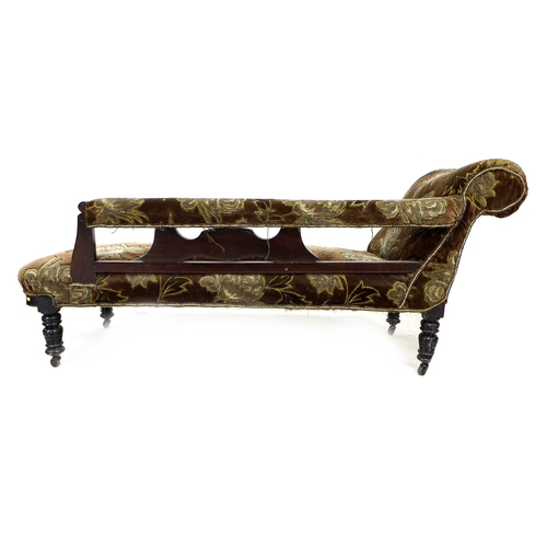 299 - A late Victorian mahogany chaise longue, with carved frame, turned legs and castors, upholstered in ... 