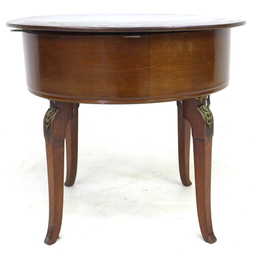 301 - A late 19th century Continental convertible stool table, with lift off circular mahogany veneered su... 