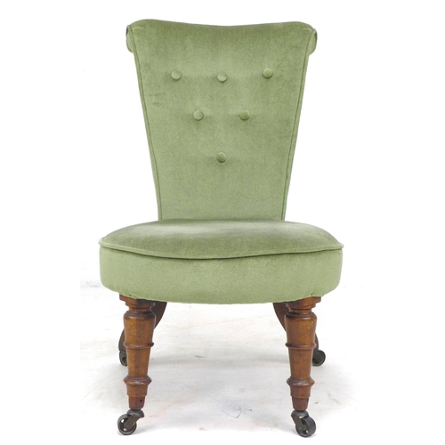 302 - An early 19th century rosewood nursing or prayer chair, later green velour upholstery, raised on tur... 