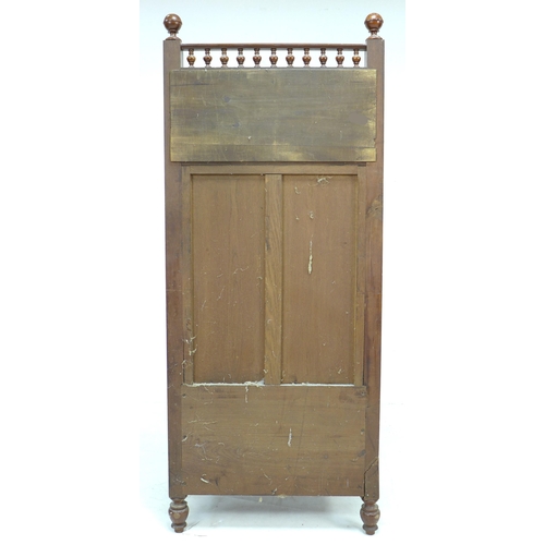 307 - A late 19th century Continental mahogany cabinet, with turned galley and mirrored upstand, twin door... 