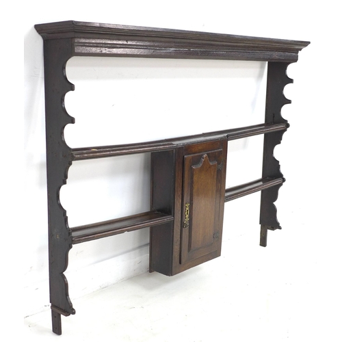 308 - A Georgian oak Welsh dresser rack top, with central cupboard, 145.5 by 19.5 by 105.5cm high.