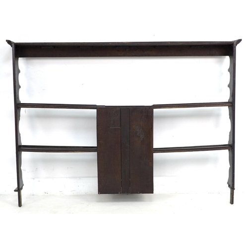 308 - A Georgian oak Welsh dresser rack top, with central cupboard, 145.5 by 19.5 by 105.5cm high.