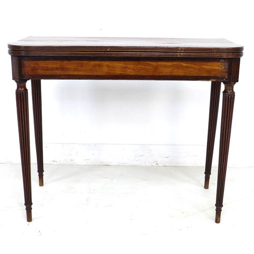 310 - An early 19th century mahogany card table, of D form, the fold over surface with crossbanding, green... 