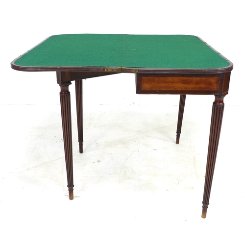 310 - An early 19th century mahogany card table, of D form, the fold over surface with crossbanding, green... 