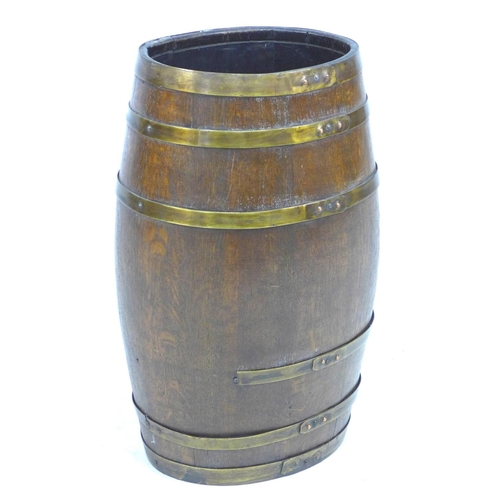 311 - A Victorian oak and brass bound coopered barrel, 37 by 30 by 61cm high.