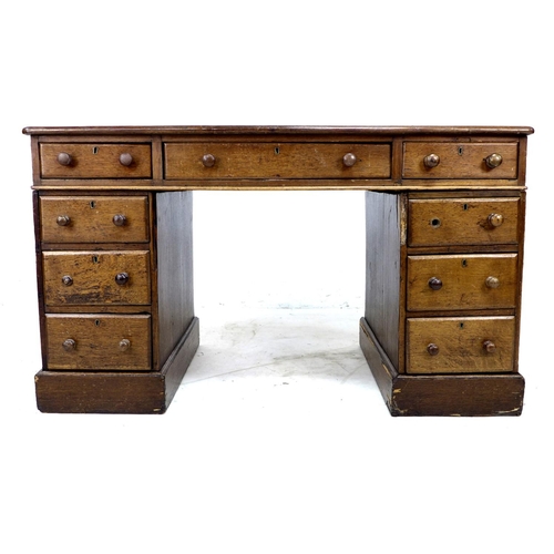 316 - An Edwardian oak pedestal desk, with inset leather top, nine drawers, a/f poor condition, 118 by 68 ... 