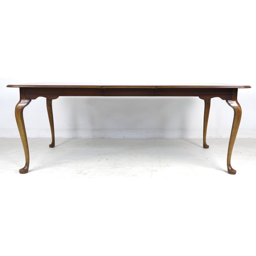 319 - A mid to late 20th century Queen Anne style extending dining table, by Ian James, with burr walnut v... 