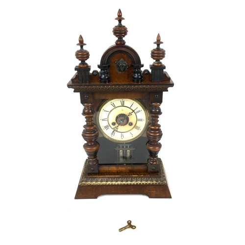 321 - A German Junghans stained pine cased mantel clock, with eight day movement, 'No. 3037', mercury styl... 