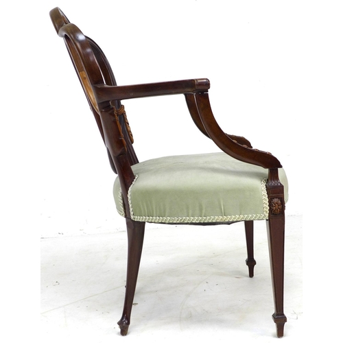 325 - An early 19th century mahogany open arm chair, after a Hepplewhite design, with open trefoil heart s... 