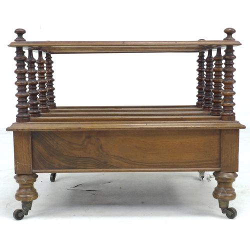 328 - An early Victorian rosewood Canterbury, three division, single drawer with turned knob, raised upon ... 