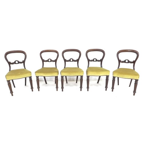 330 - A set of five Victorian balloon back chairs, with decorative carved laurel leaf splats, upholstered ... 