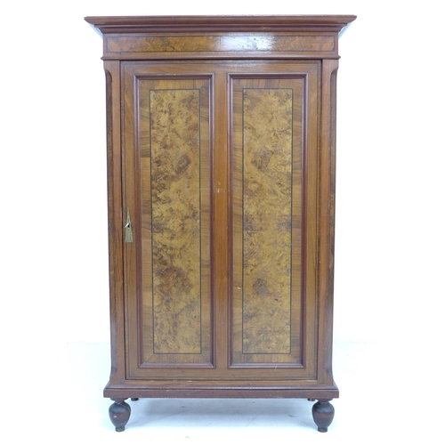 337 - A 19th century Continental walnut cabinet, with burr walnut veneer and ebony stringing, the single d... 