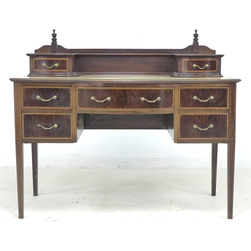 339 - An Edwardian mahogany, line inlaid and crossbanded desk, upstand with two trinket drawers over a gil... 