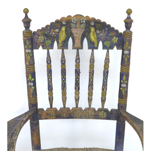 342 - A Spanish painted rush seated open armchair, early 20th century, with shaped open arms and ladder ba... 