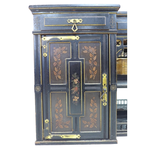 346 - A Victorian Gothic breakfront sideboard, ebonised and gilt highlighted, three frieze drawers with br... 