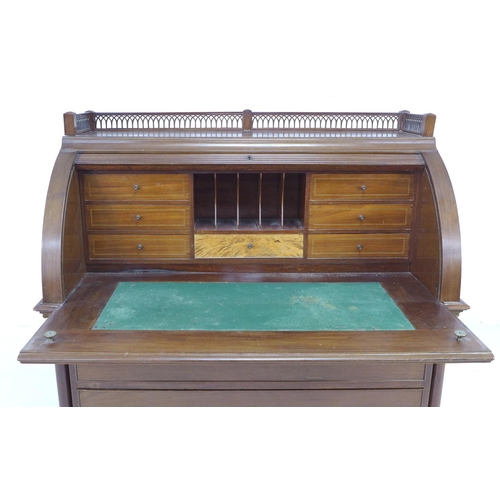 350 - A 19th century Northern Continental roll top desk, pierced three quarter gallery over a drum fronted... 