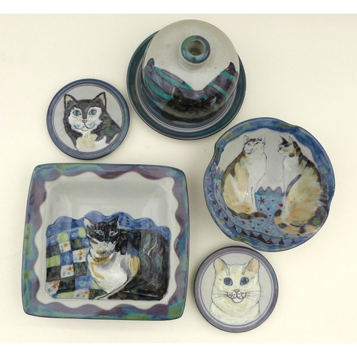 36 - A group of Highland Stoneware pottery all depicting cats, comprising one medium bowl, one square dis... 